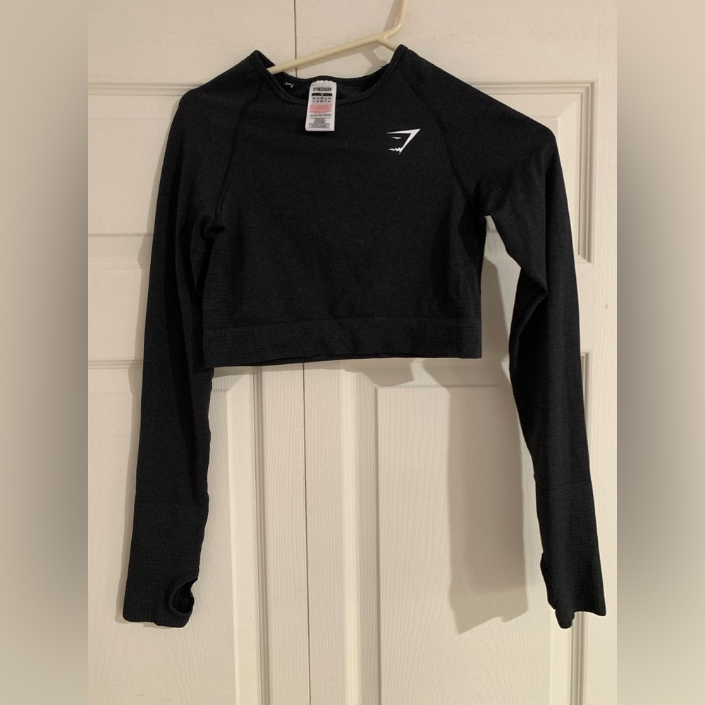 Gym Shark “Vital Seamless Long Sleeve Crop Top” (first edition, black)
